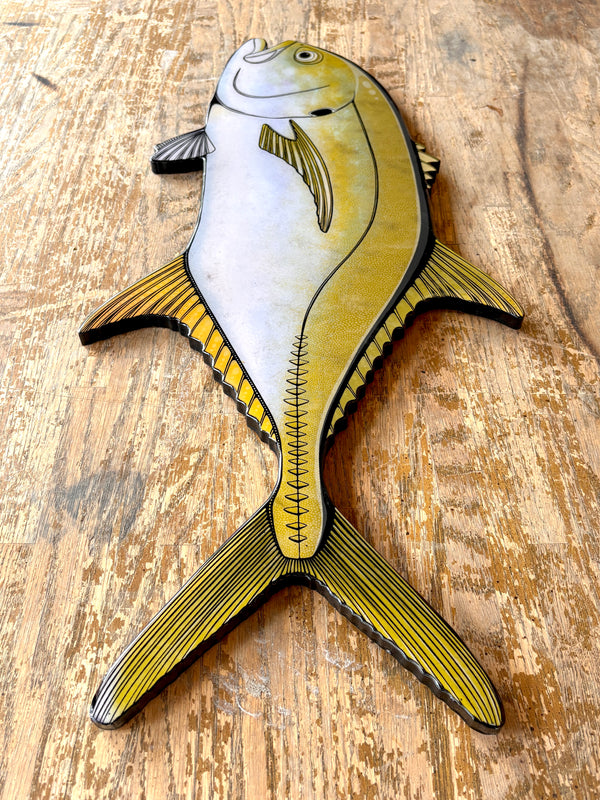 Decorative Crevalle Jack fish wall art on a wooden surface